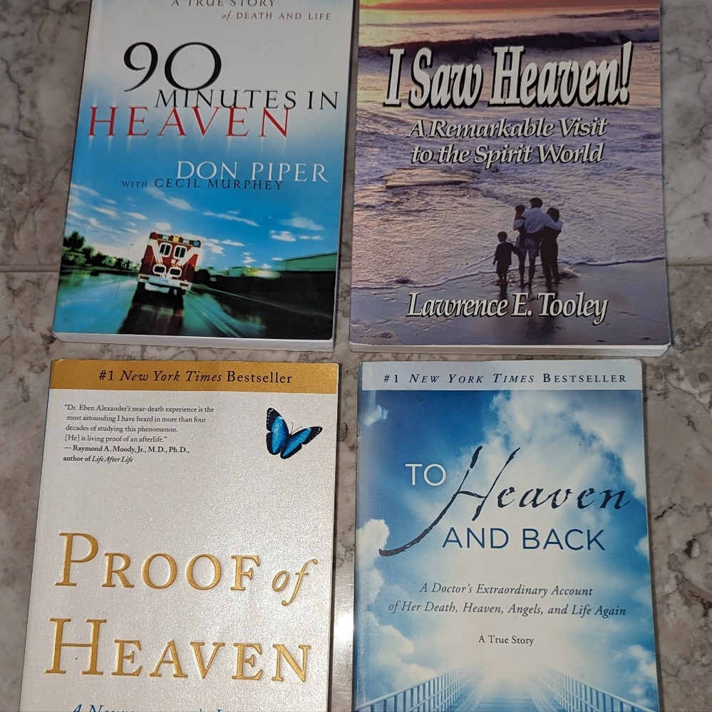 Four paperback copies of life after death books: "90 Minutes in Heaven", "To Hea